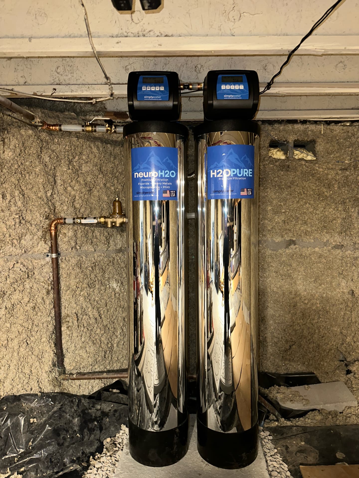 Two-tank Simply Water installation in a basement mechanical space