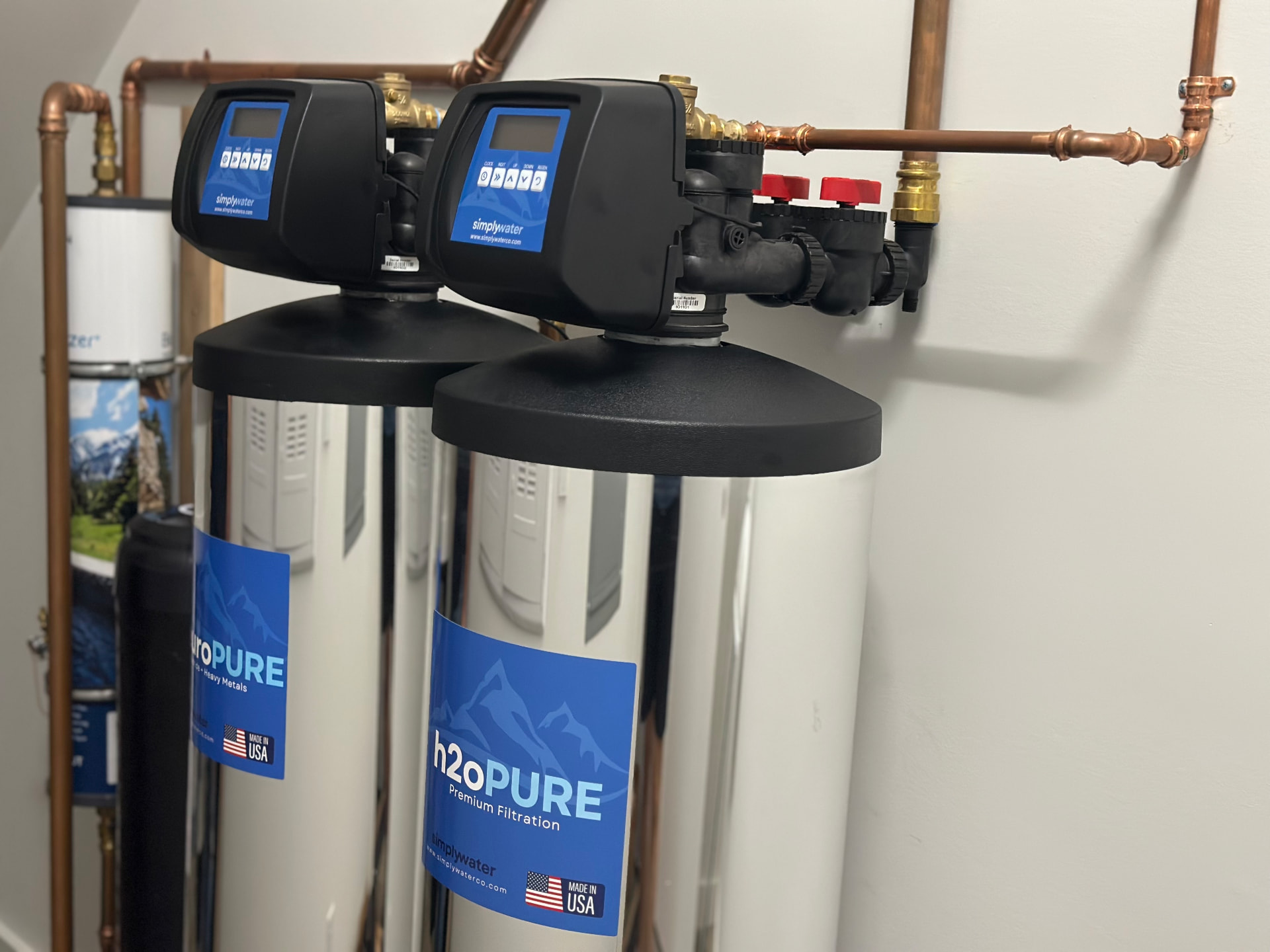 Simply Water control valves on a two-tank residential filtration installation